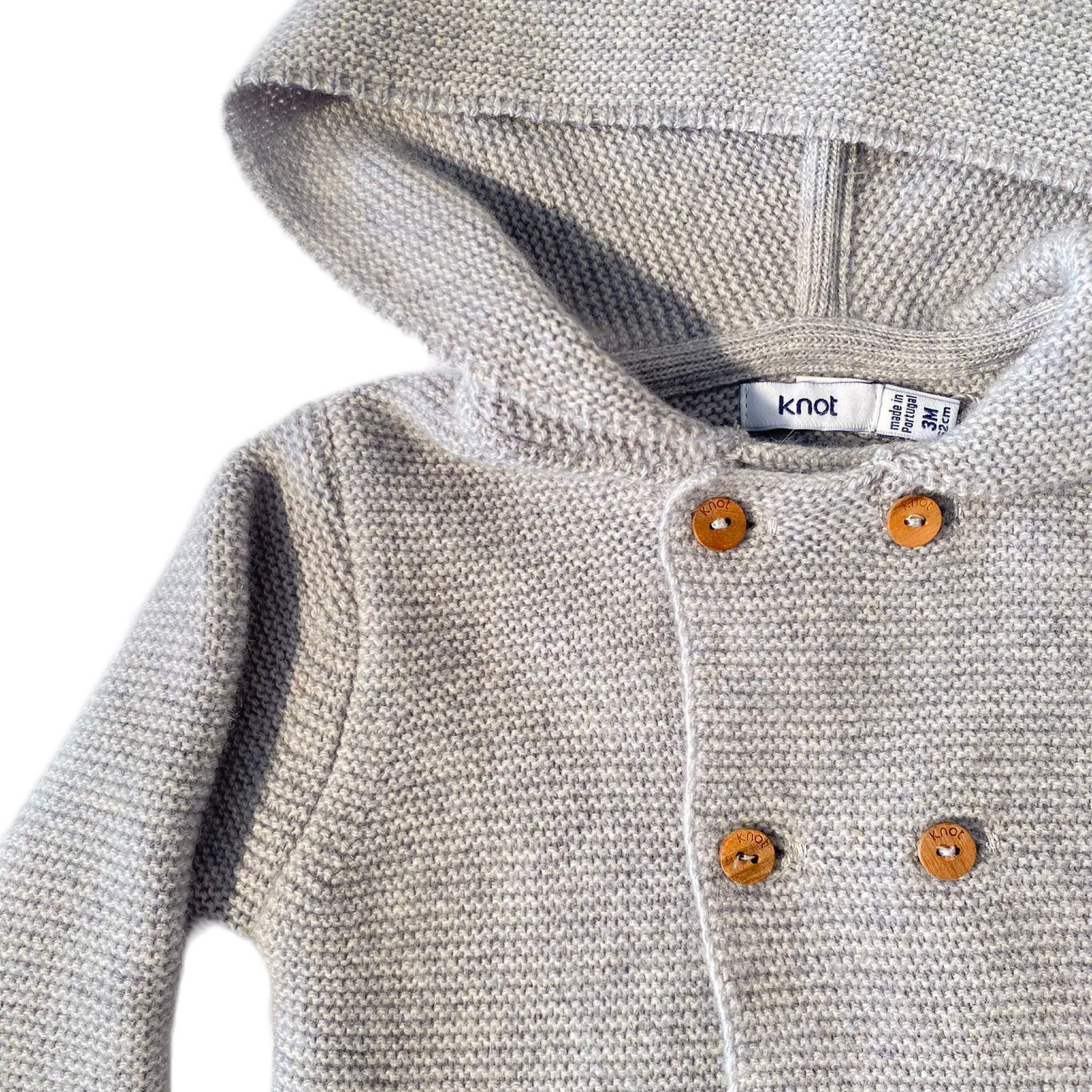 Gilet en maille à capuche